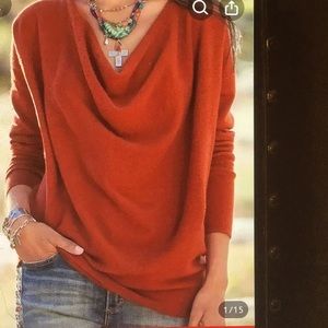 Casual long sleeve timeless cut top.brand new in shipment bag